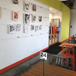 a restaurant with tables and chairs