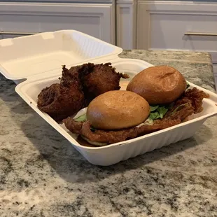 The Big Fish sandwich with cucumbers and dill ranch, with a side of corn fritters.