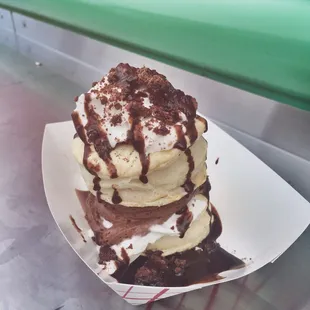 Cronut with raspberry filling and chocolate mousse. Delicious and light. My friend thought it needed crunch, maybe chopped nuts?