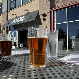 three beers on a table