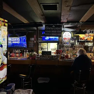 a man sitting at a bar