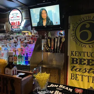 a woman behind the bar