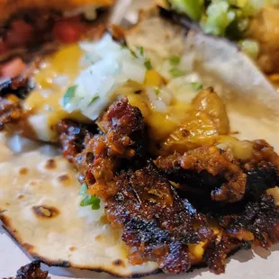 a close up of a taco