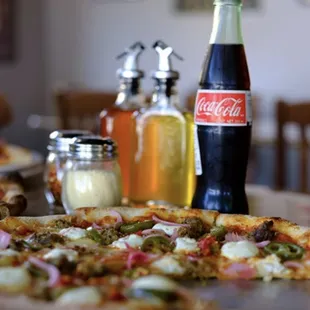 Dine In With Us! Sit back, unwind, and let us take care of you while you try our authentic Italian pizza made with high-quality ingredients