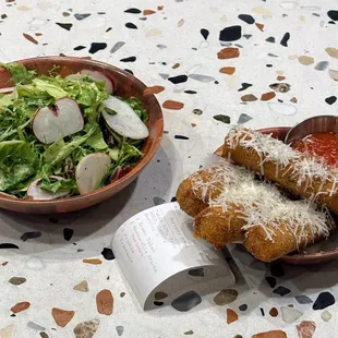 Salad and mozzarella sticks