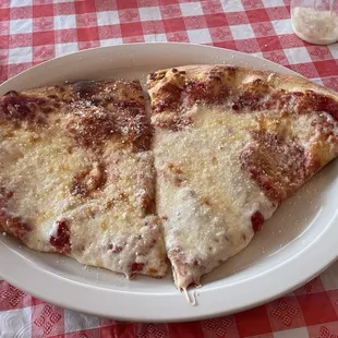 Lunch special, two slices and a drink for $7.99 and these slices are BIG. I cut each in half and had four decent slices.