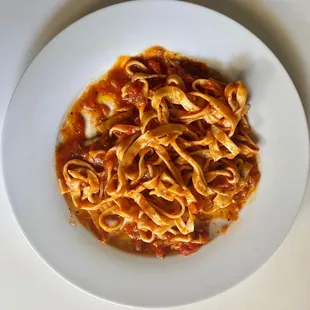 a plate of pasta on a table