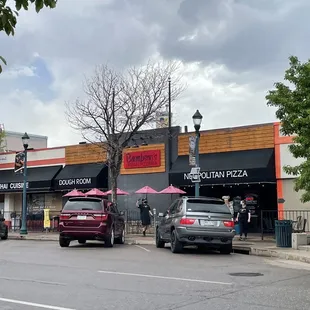 cars parked in front of the restaurant