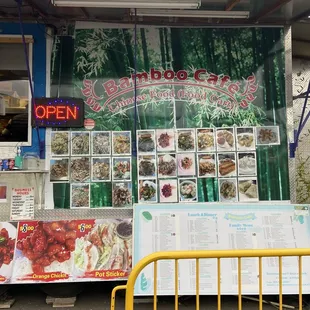 a food stand with menus on it