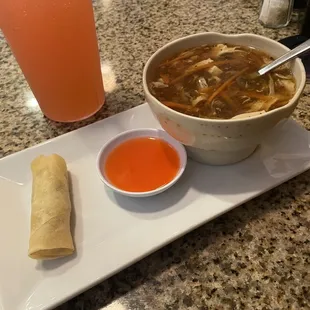 Lunch special appetizer; egg roll, egg roll sauce and hot &amp; sour soup w/pink lemonade