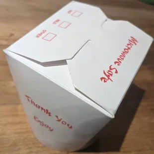 The container which the manager insisted had a number indicating size.