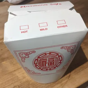 The container which the manager insisted had a number indicating size.