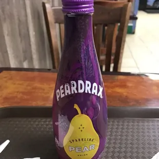 a bottle of peardrax on a table