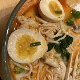 Hell ramen with egg (takeout) with chicken and added veggies