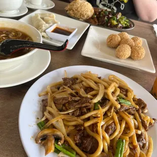 Beef Udon, sesame balls, hot and sour soup, steamed dumplings and beef &amp; broccoli.