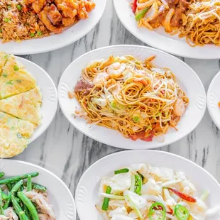 a variety of asian food dishes