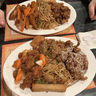 Two dinner plates one sesame chicken and sweet and sour chicken and one with orange chicken and sweet and sour shrimp