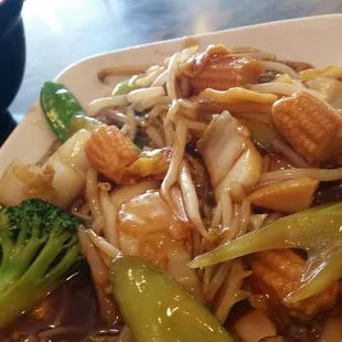 Vegetable chow mein with side of fried rice.