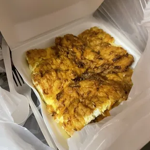 Just egg, no bean sprouts or anything else for that matter, tasteless..worse I've ever had