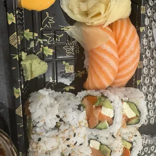 philadelphia roll with nigiri salmon