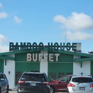 cars parked in front of the restaurant