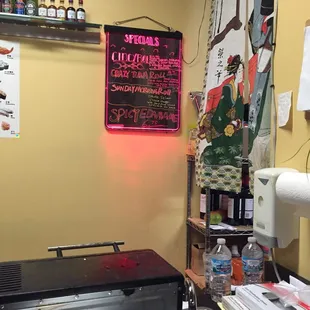 a bar with a neon sign