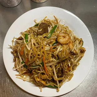 a plate of stir fried noodles