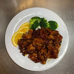 a plate of chicken and broccoli