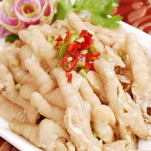 Spicy Pickled Chicken Feet is a popular Chinese cold dish known for its unique texture and bold, tangy flavor.