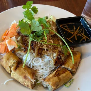 Bamboo Special with pork - Rice vermicelli bowl with spring roll. I love the crispy meat. The cut of the pickled veggies adds texture too.