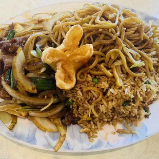 Mongolian Beef, fried rice and chow mien with a crab star