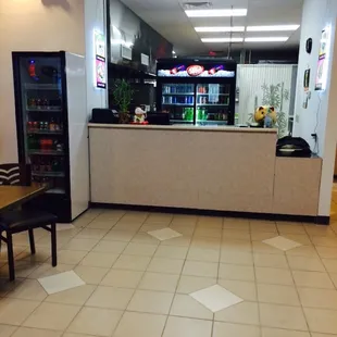 a view of the kitchen from the dining room
