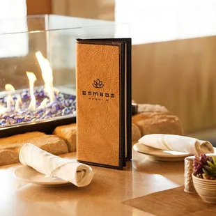 a table setting with a fire place