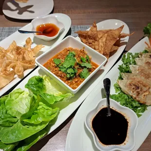 Light and crispy crab rangoon, chicken lettuce wraps and pan fried pork dumplings. All delicious!