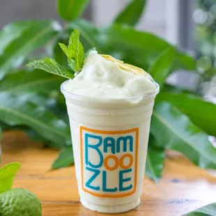 a smoothie in a plastic cup