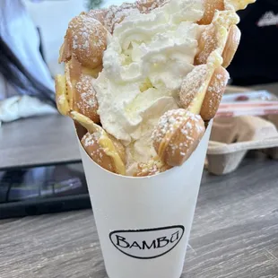 My daughter got the bubble waffle (regular with just powdered sugar and whipped cream).