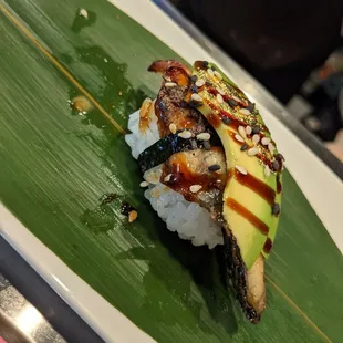 Eel w/ avocado, golf flakes, and truffle essence