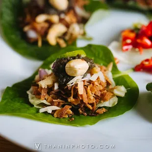 a plate of food on a wooden table
