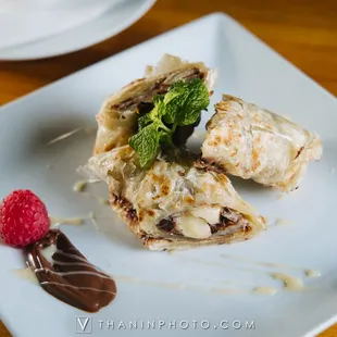 a plate of food on a wooden table