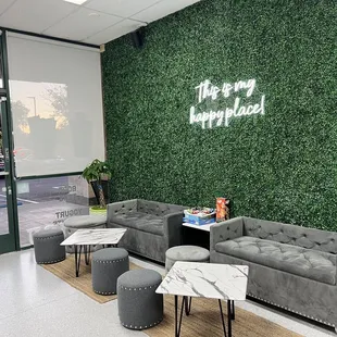 a living area with couches and tables