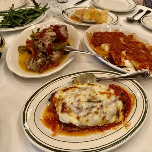 Pork Chop alla Bamonte, Ravioli with Meat Sauce and Eggplant Parmigiana