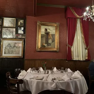 a man sitting at a table in a restaurant