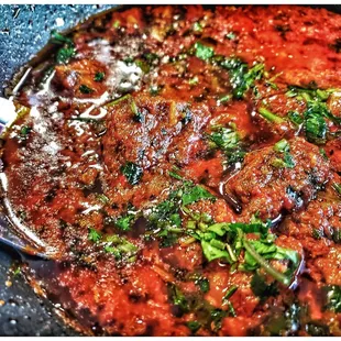 Lamb Karachi. Served in the pan. Nicely seasoned and oh so delicious.