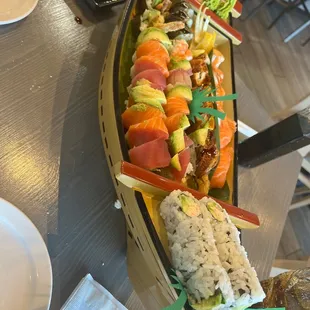 We got the boat!!! Rainbow roll, California roll, dragon roll, and a tempura roll.