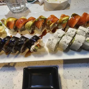 Ninety Nine Roll (specialty $18.63) Salmon Skin Roll ($8.28) California Roll (FREE Birthday Roll)