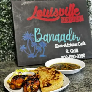Grilled chicken, served with maheragwe (spinach and beef stew)