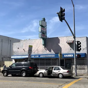 cars parked in front of it