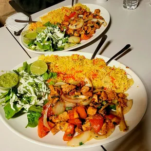 2 chicken and rice  plates.