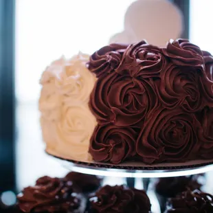 Half and half three layer cake for wedding: detail showing roses.