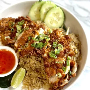 Fried chicken over fried rice